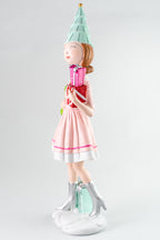 Pink Resin Girl Holding Gift And Wreath