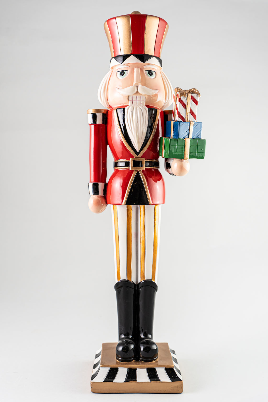 Resin Nutcracker Holding Gifts