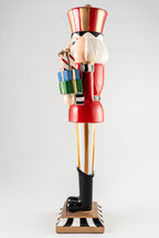 Resin Nutcracker Holding Gifts