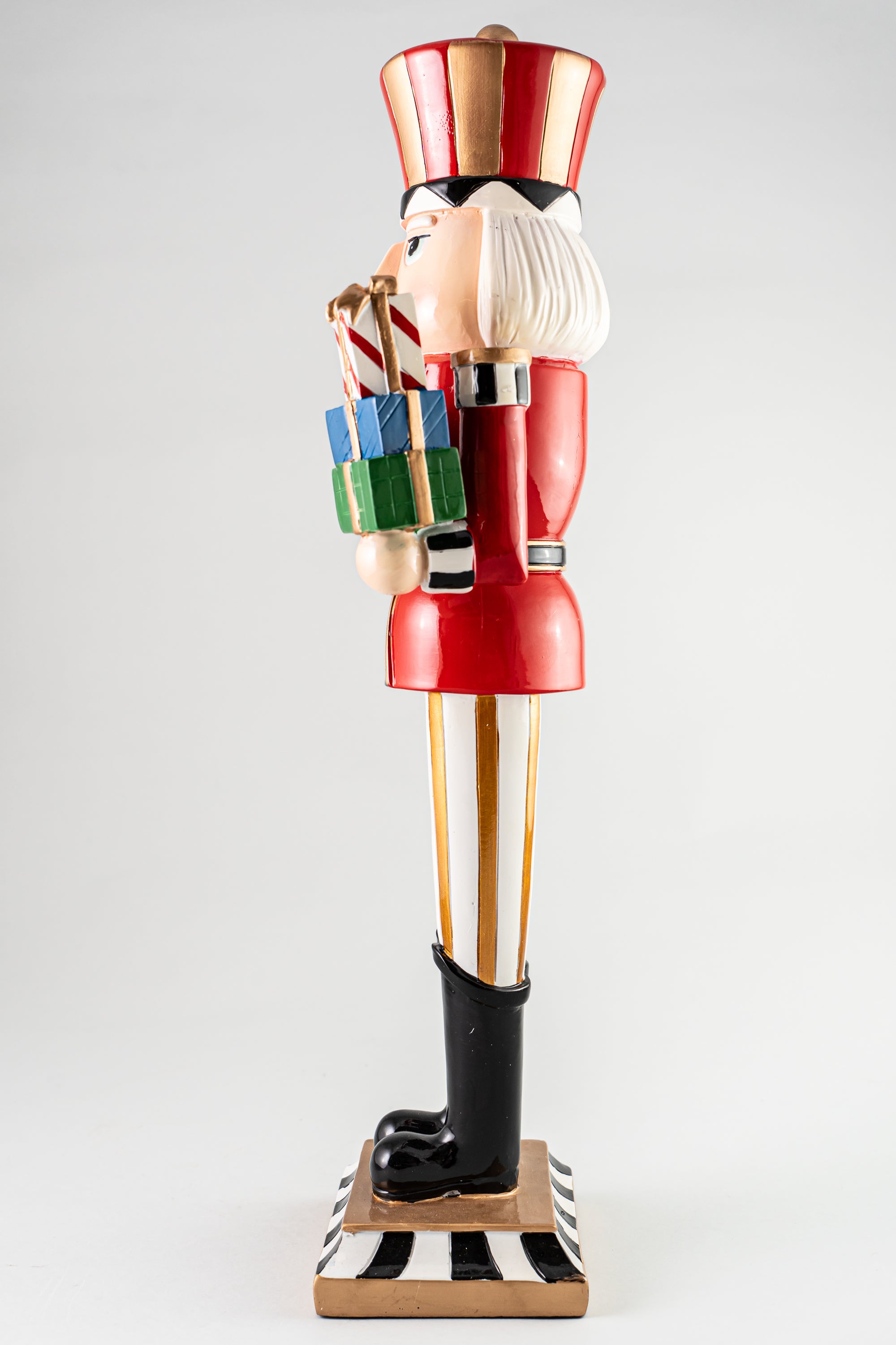 Resin Nutcracker Holding Gifts