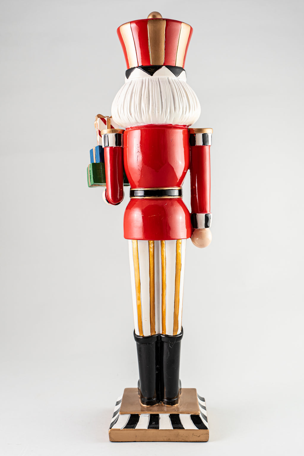 Resin Nutcracker Holding Gifts