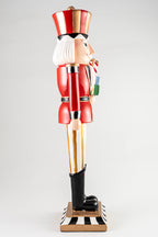 Resin Nutcracker Holding Gifts