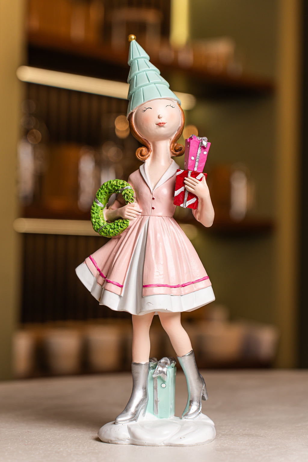 Pink Resin Girl Holding Gift And Wreath