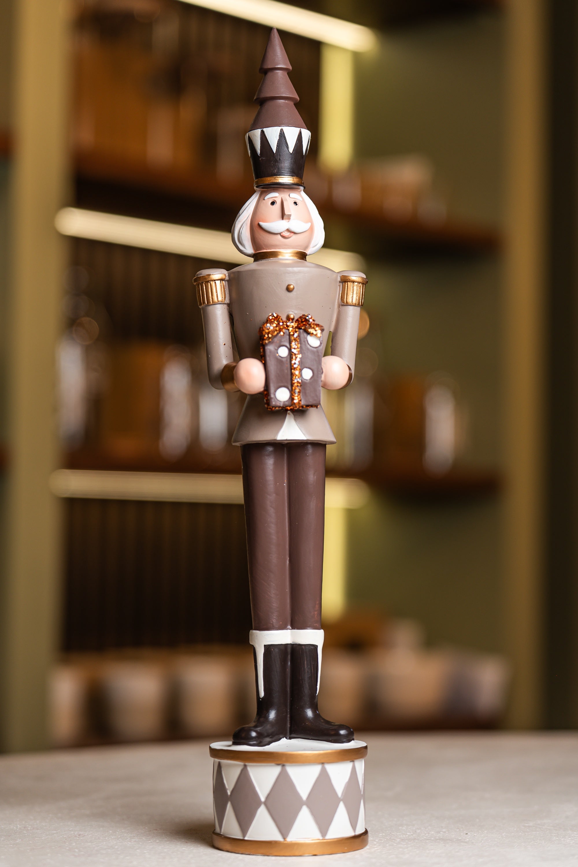 Brown Resin Soldier Holding Gift Box