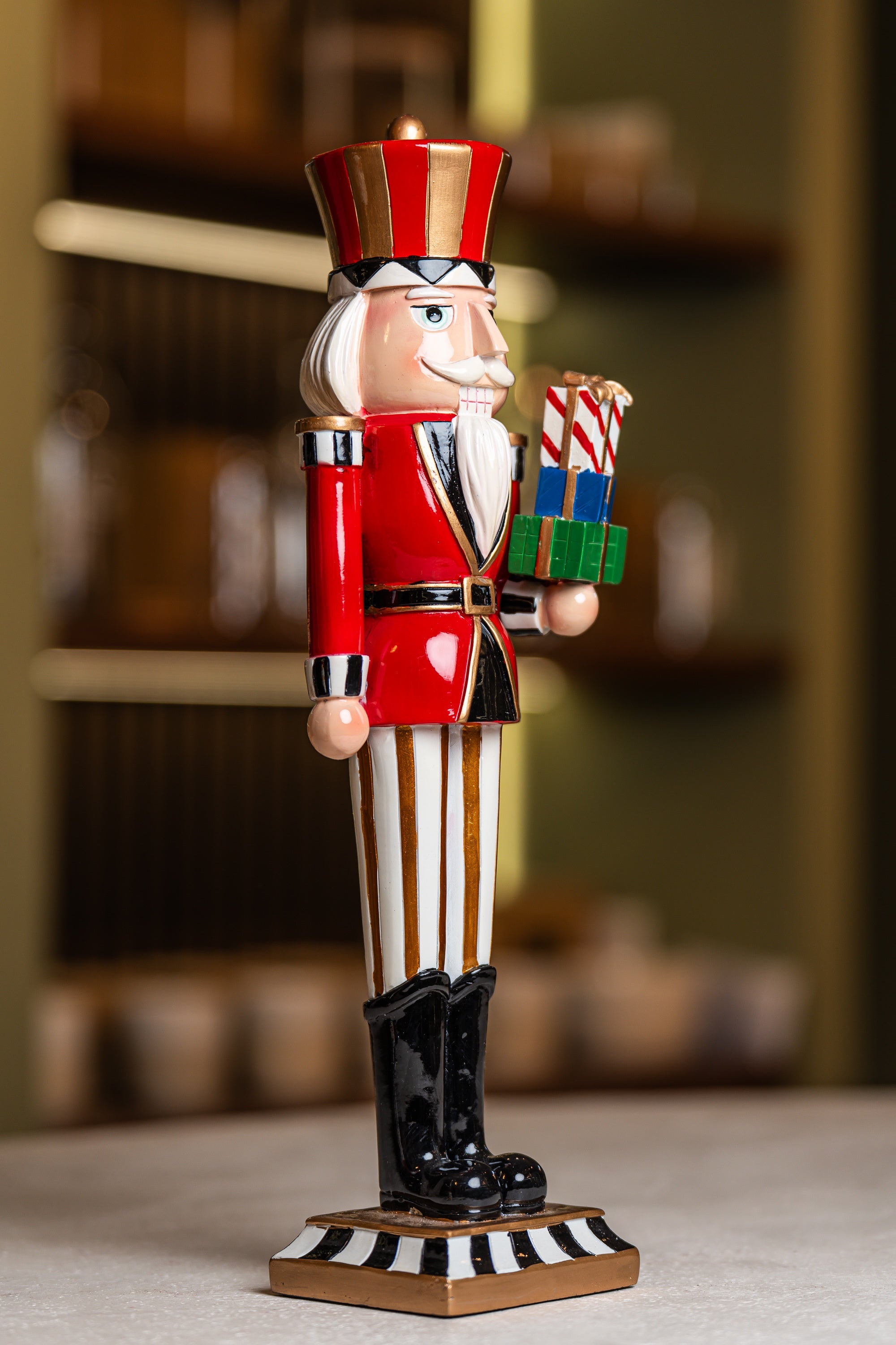 Resin Nutcracker Holding Gifts