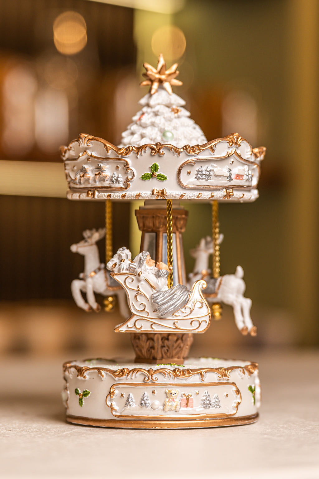 Xmas White/ Gold Resin Winding Carousel With Horses, Music & Movement.