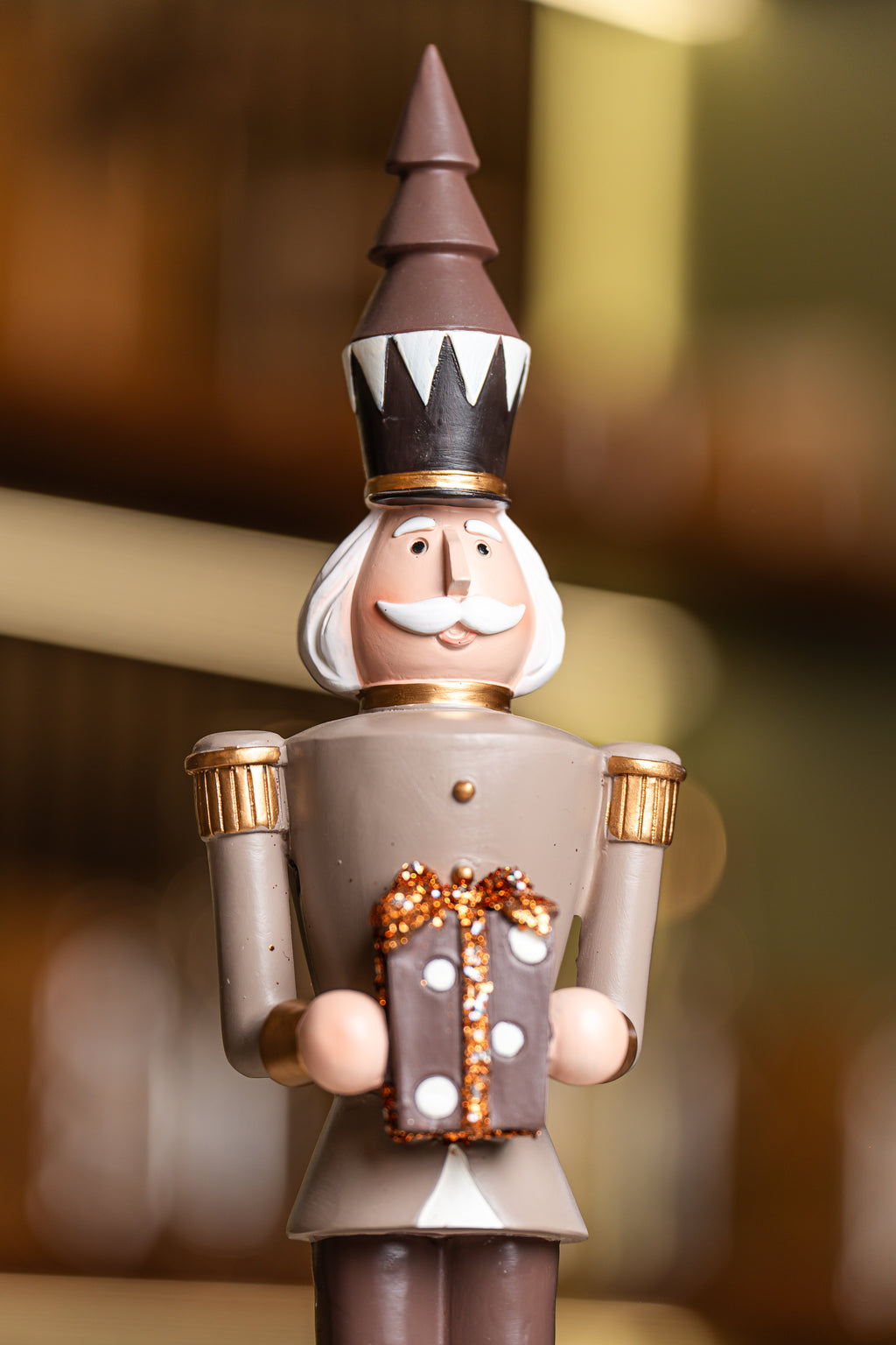 Brown Resin Soldier Holding Gift Box