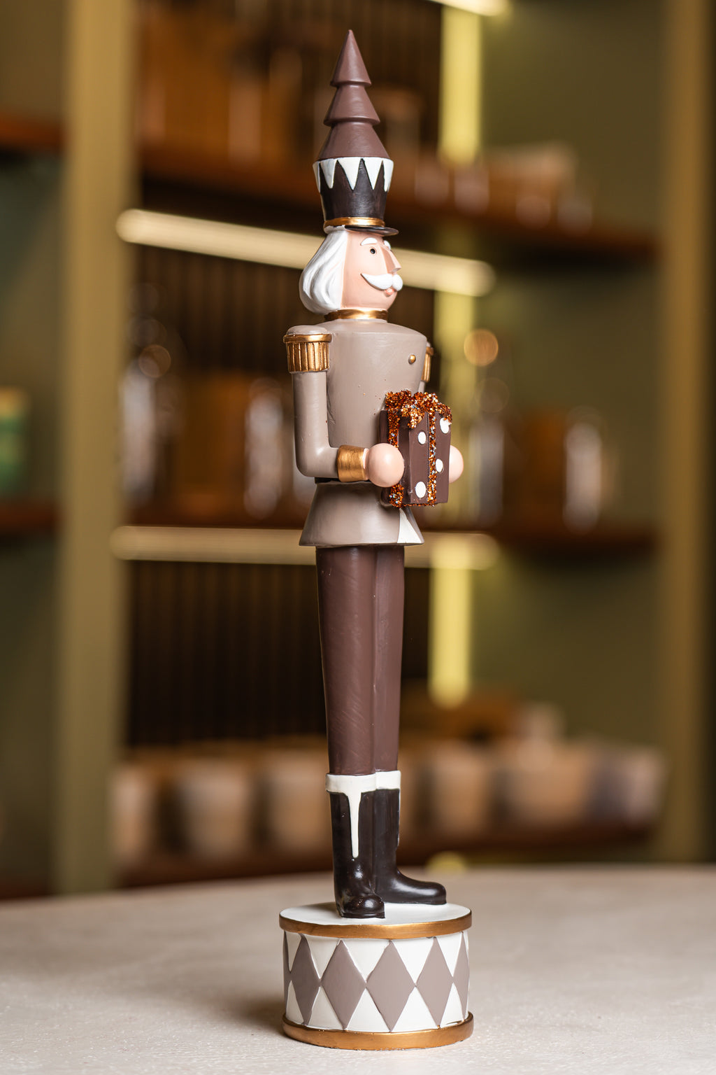 Brown Resin Soldier Holding Gift Box