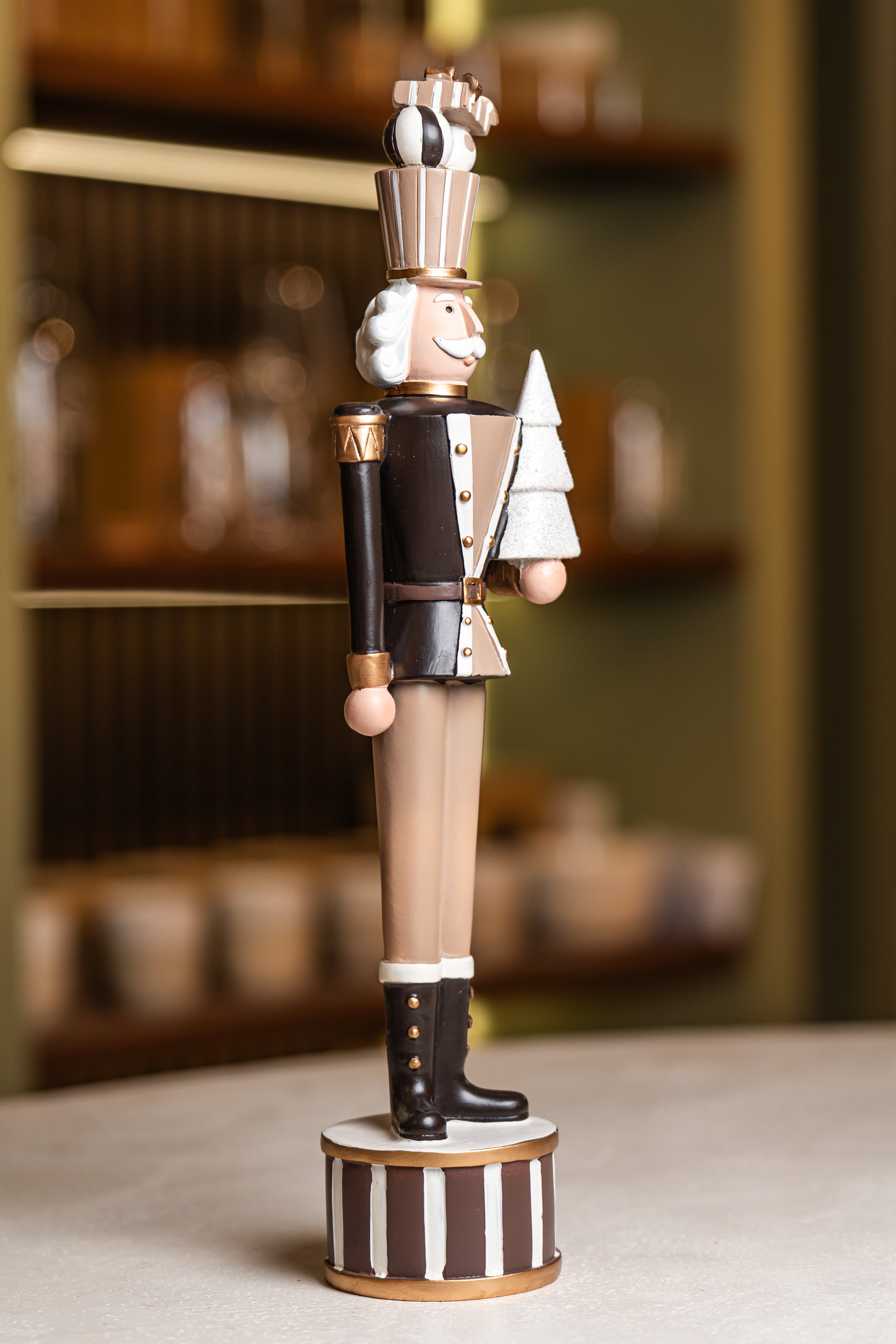 Brown Resin Soldier Holding Tree